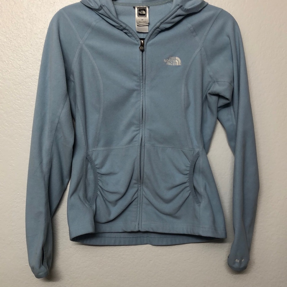 Powder blue North Face jacket with thumb holes